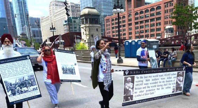 2022_Memorial Day Parade_Chicago_Sikh Contingent_walking with posters.jpg