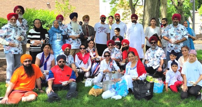 2022_a Memorial Day Parade_Naperville IL_Sikhs_Group Langar after the parade.jpg